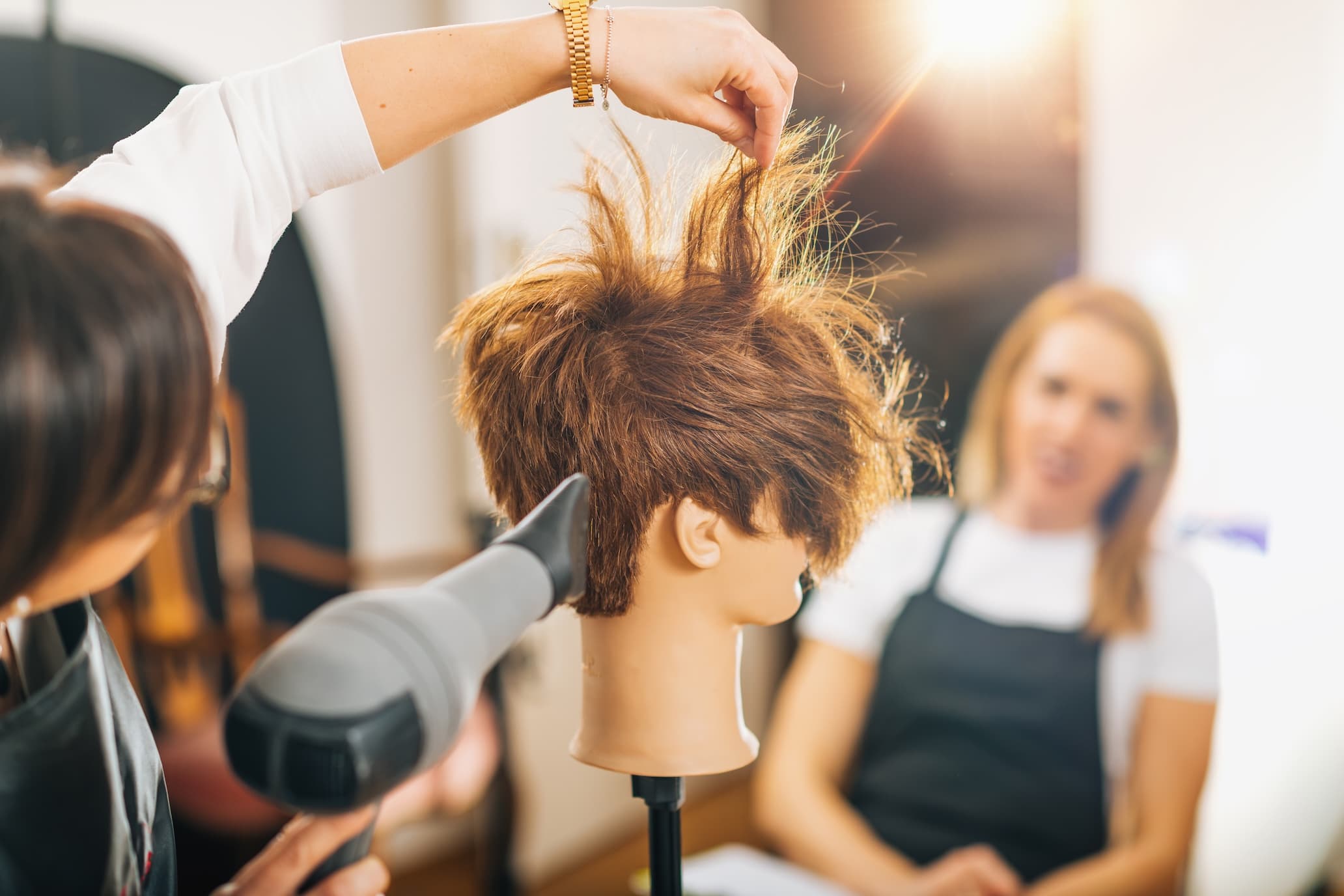 Academy or salon interior, warm and softly lit